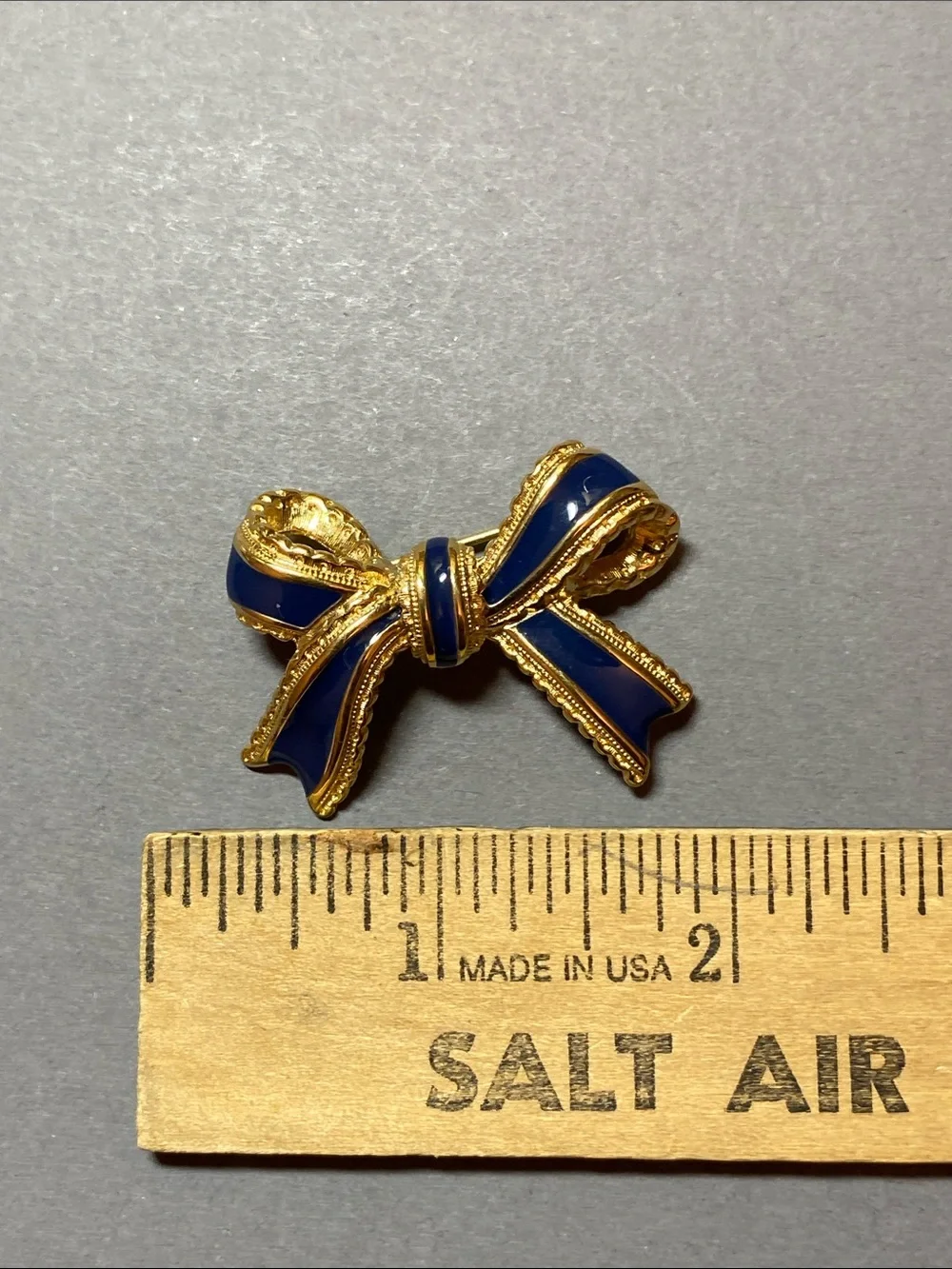 Vintage gold navy enamel bow pin brooch
